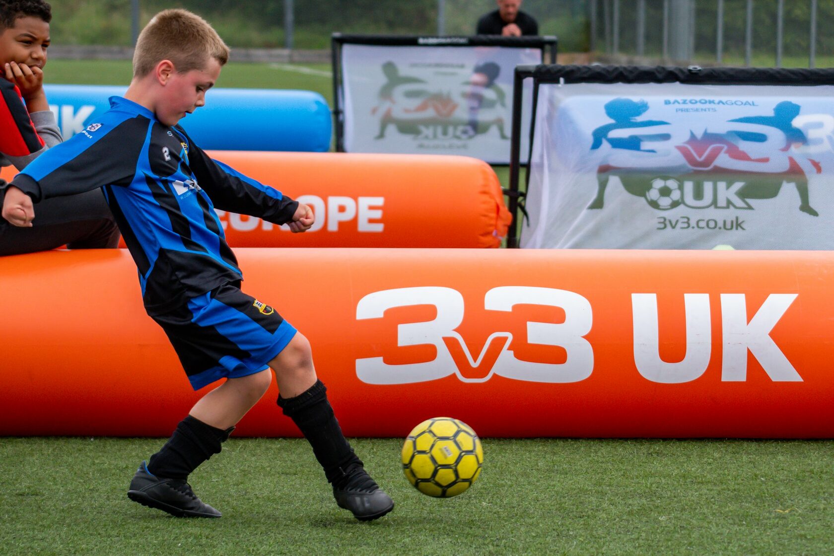 A young football player developing skills